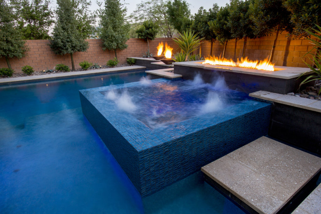 A picture of a spa in a swimming pool. 