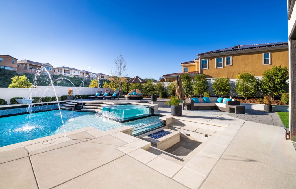 Backyard pool with some fountain