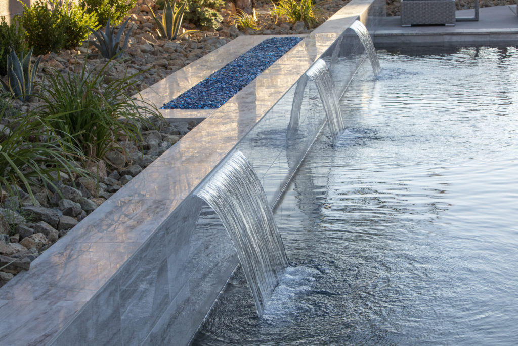 pool with small waterfalls