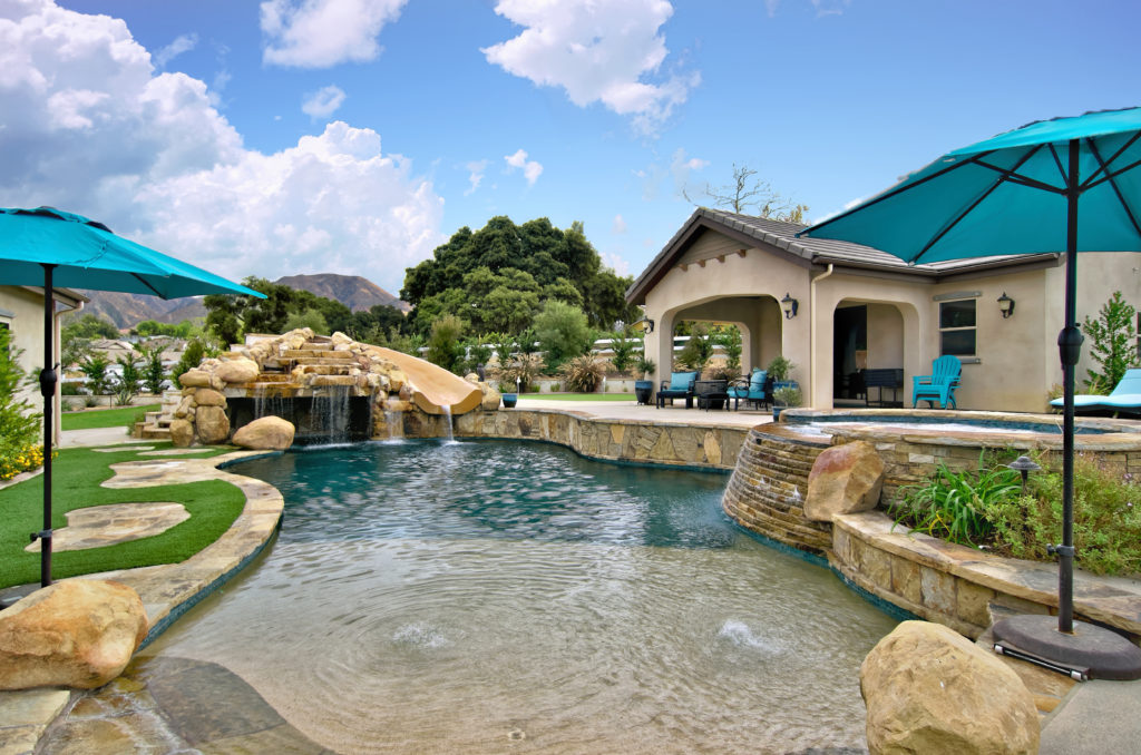 swimming pool with surrounding landscape