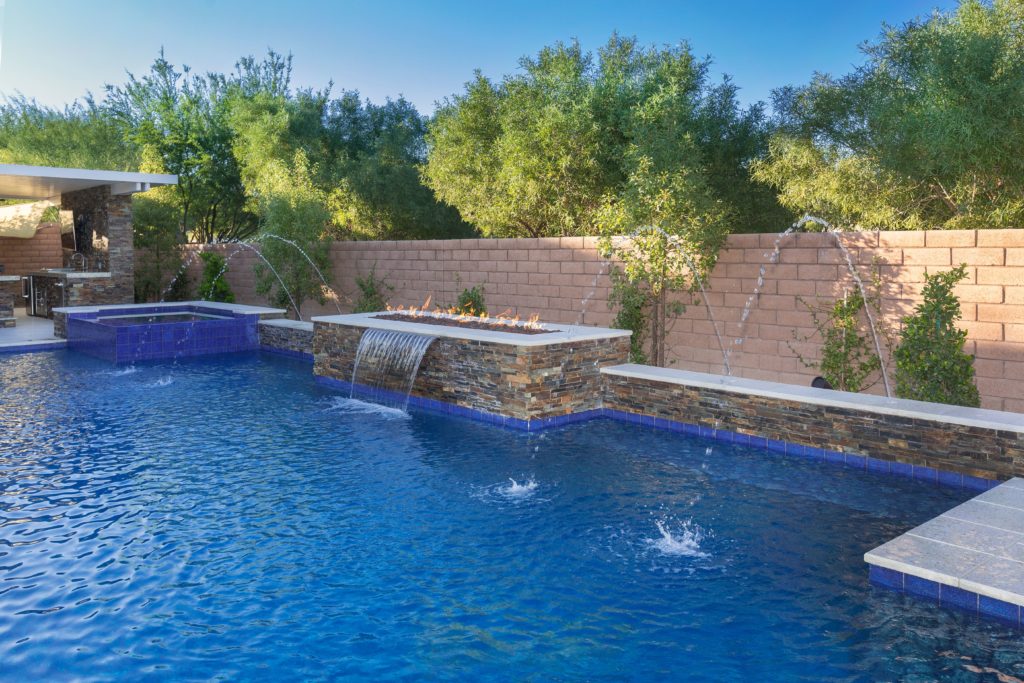 Pool with fountain and a bonfire